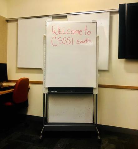 whiteboard with red handwritten text